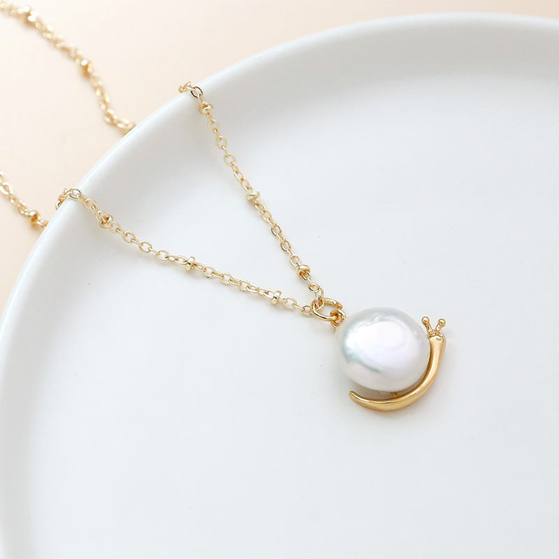Bộ 1 Đồng Mạ Vàng Thật Ốc Tran - đánh giá và giá Body Jewelry Real Gold